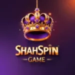 Golden crown logo with the word "ShahSpin" written below on a brown background.